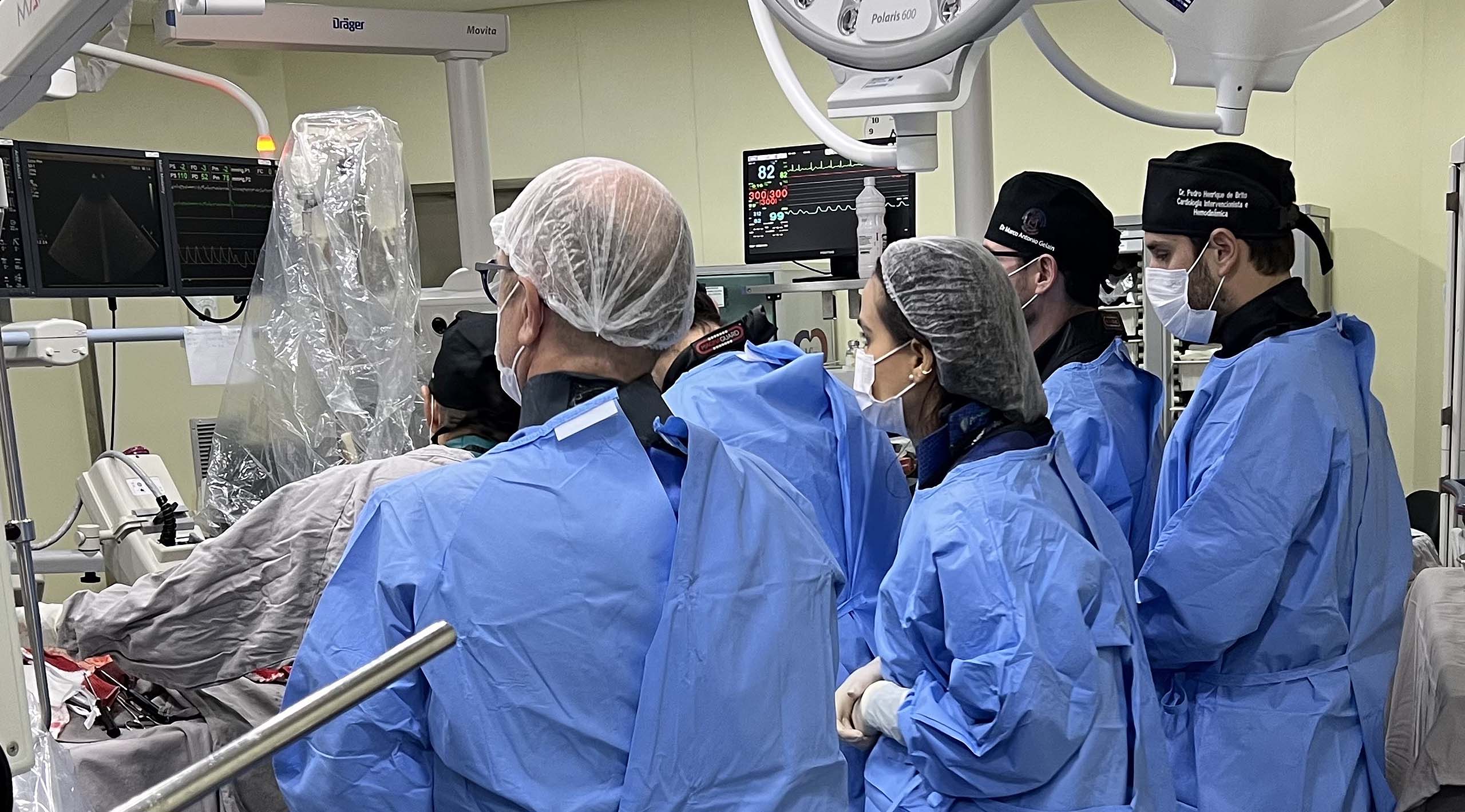 Group of surgeons performing an operation